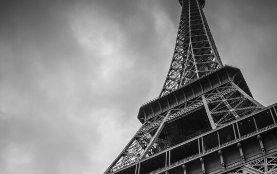 Photo of the Eiffel Tower as the AI Action Summit 2025 kicks off in Paris, France where global leaders are discussing how to ensure artificial intelligence development continues in a responsible and equitable manner with ethics at its heart that addresses issues such as bias while unlocking its potential for innovation in areas such as healthcare.